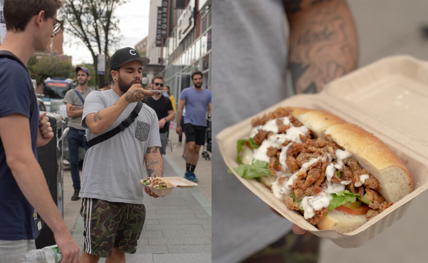 Erick Castro photographs his vegan fried-oyster-mushroom po'boy outside of a Whole Foods in Brooklyn.