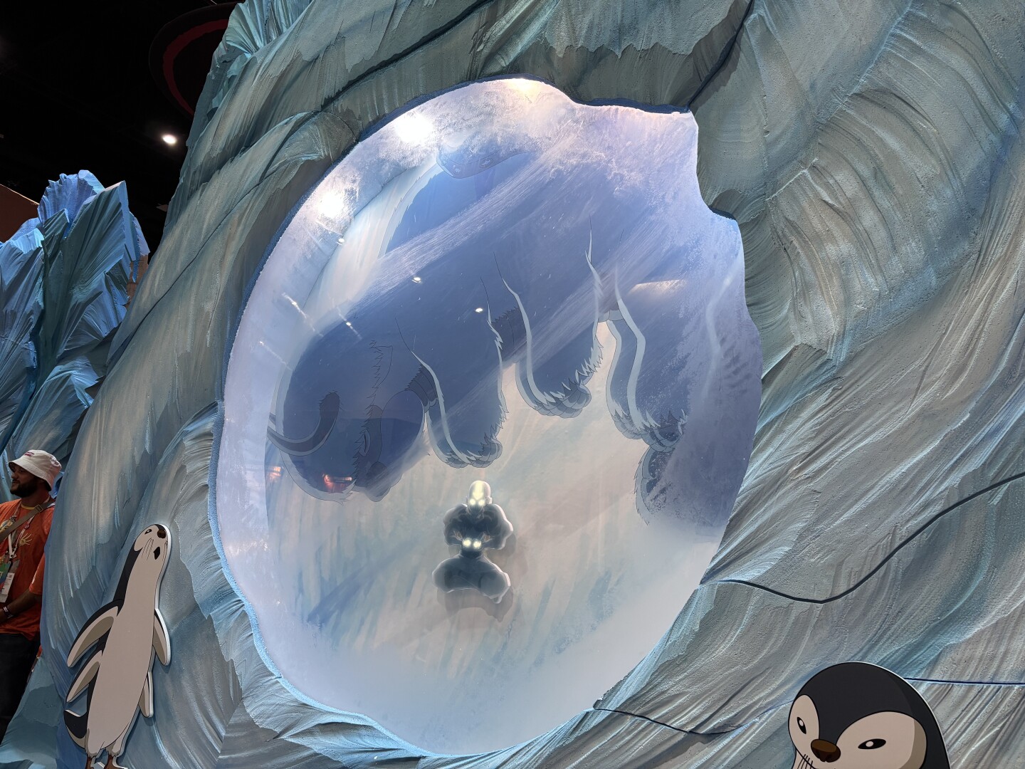 The Nickelodeon booth draws inspiration from a scene in the first episode "Avatar: The Last Airbender" where Aang, the young avatar, is frozen in an iceberg. Nickelodeon highlighted "The Legend of Aang," a new film about the protagonist, is scheduled to release in October 2026.
