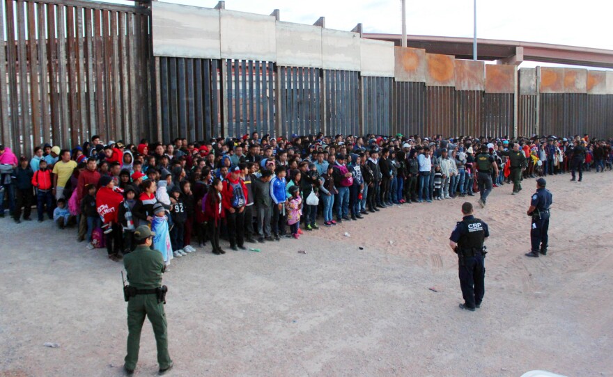 President Trump has announced plans to impose escalating tariffs on goods imported from Mexico in an attempt to stop migrants from entering the U.S. over the southern border. U.S. Customs and Border Protection released this photo, taken on Wednesday at El Paso, Texas.