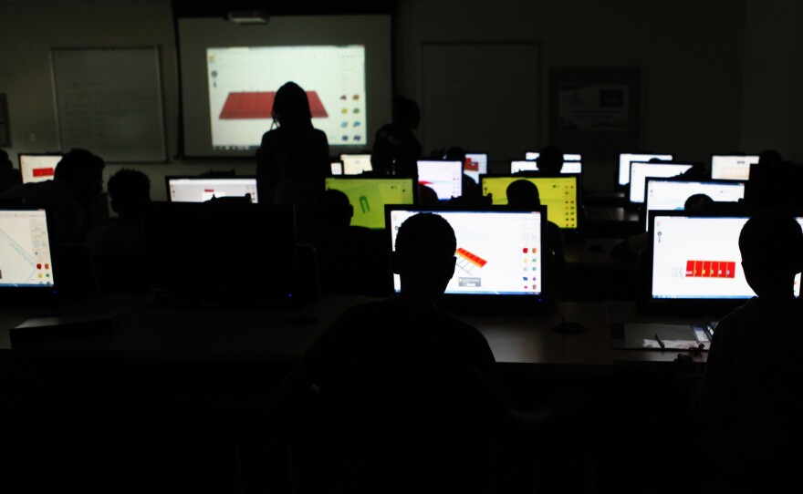 Middle-school boys design apps at Morgan State.