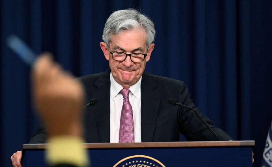 Fed Chair Jerome Powell takes questions during a news conference in Washington, D.C, on Wednesday. The Fed earlier raised interest rates by half a percentage point, its biggest hike in more than two decades.