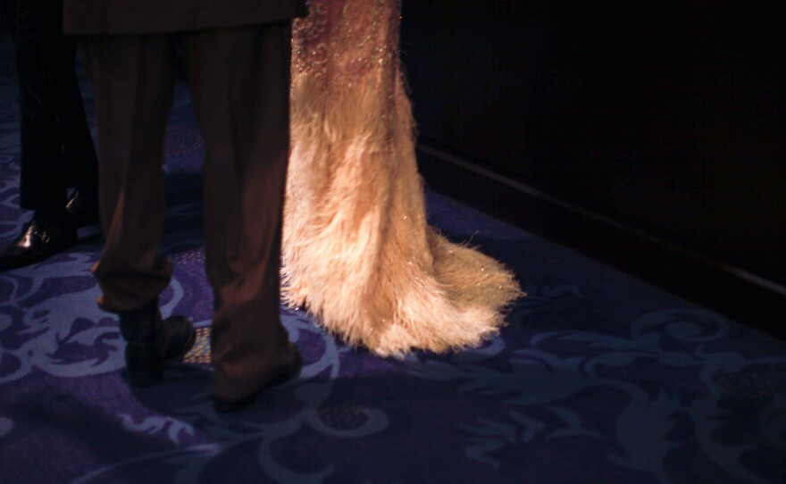 A couple exiting the 102nd White House Correspondents' Dinner on Saturday, April 30,2016 in Washington, D.C.