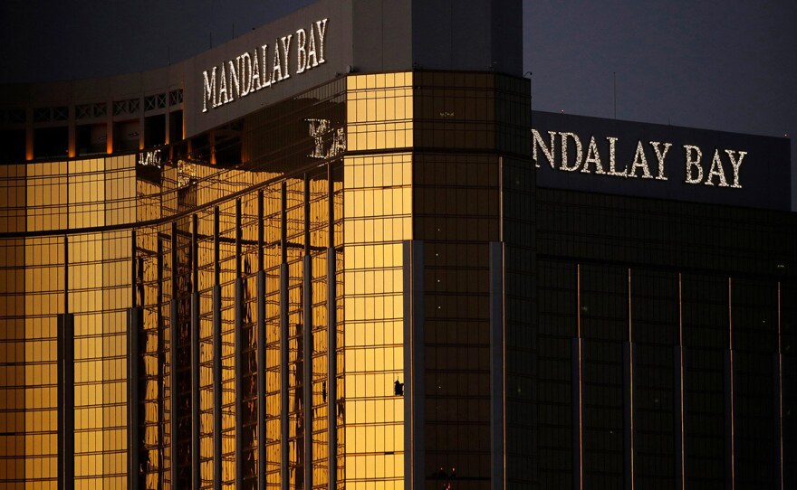 In this Oct. 3, 2017, file photo, windows are broken at the Mandalay Bay resort and casino in Las Vegas, the room from where Stephen Craig Paddock fired on a nearby music festival, killing 58 and injuring hundreds on Oct. 1.