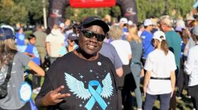 Jerry McCormik wears a cancer awareness shirt at an event in this undated photo.