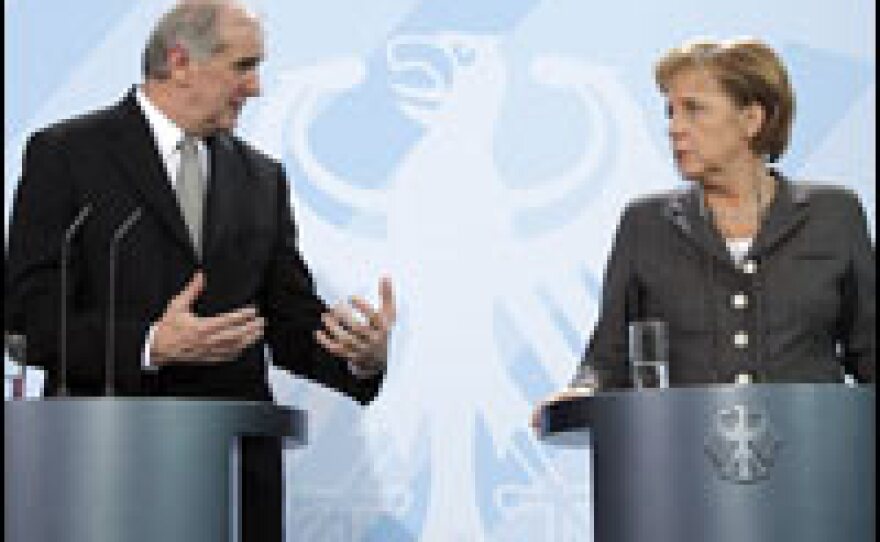 Liechtenstein Prime Minister Otmar Hasler (left) speaks with German Chancellor Angela Merkel at a news conference Feb. 20, 2008, in Berlin.