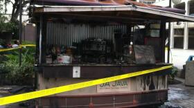 The Ja Java coffee cart after it was burned by a suspected arsonist on September 12, 2012.