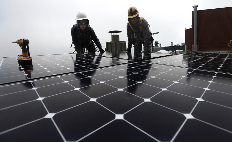 The Build Back Better legislation included billions to accelerate clean energy like rooftop solar, but with the bill now stalled in Congress, cutting U.S. emissions will be tougher.