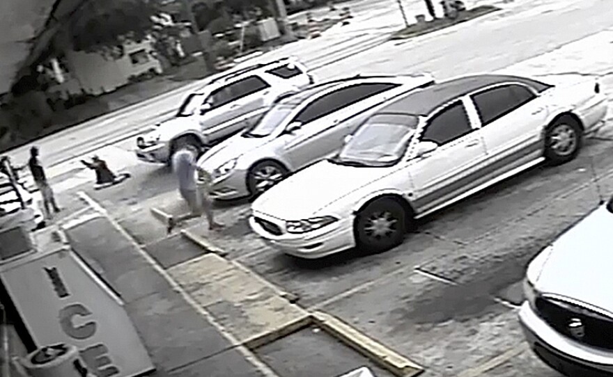 This image taken from surveillance video released by the Pinellas County Sheriff's Office, shows Markeis McGlockton (far left) and Michael Drejka involved in an altercation in a convenience store parking lot in Clearwater, Fla., last week.