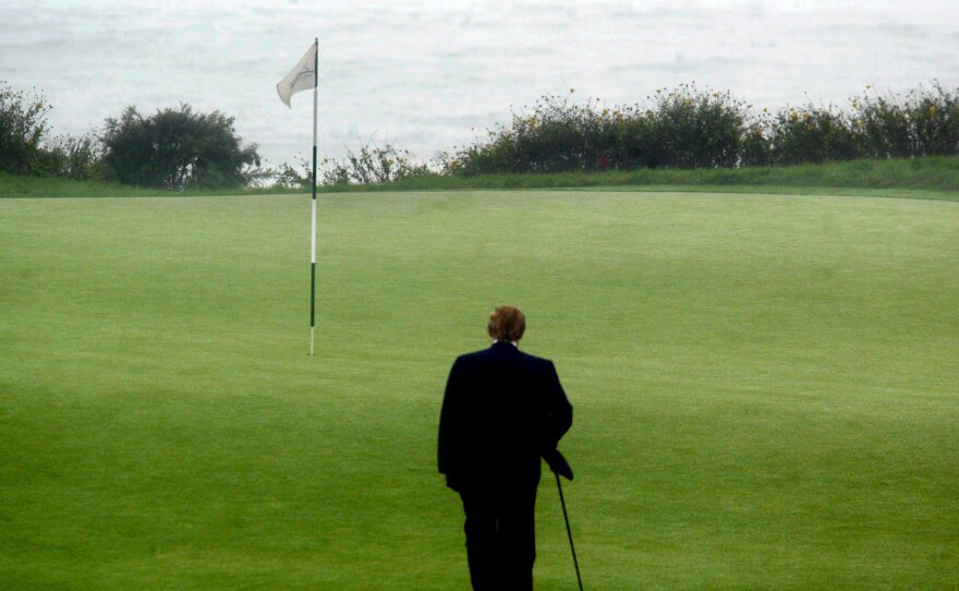 As part of a portrait session, Donald Trump walks toward the 11th tee on Trump National Golf Club Los Angeles in Rancho Palos Verdes, Calif.