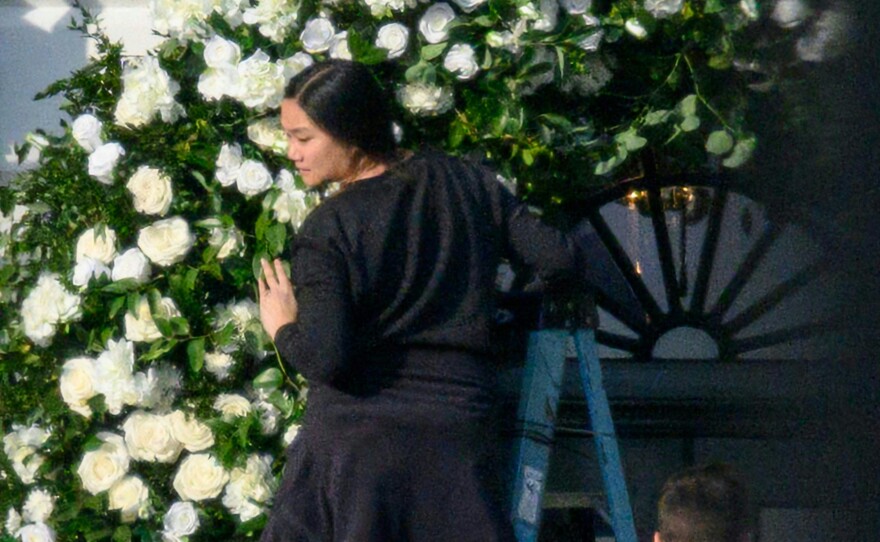 Wedding details were kept under wraps. The day before the ceremony, workers arranged flowers and seating at the South Portico of the White House.