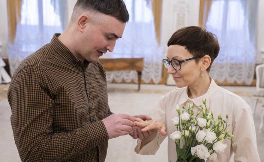 After long eschewing marriage, Pyotr Kolyadin and Tatyana Neustroyeva wed in April in St. Petersburg, Russia. It's "sort of like an anchor that you throw forward and maybe somehow it will pull you out," Pyotr says.