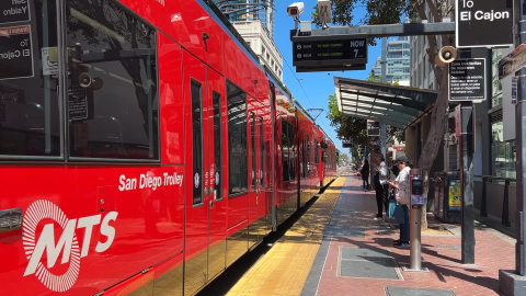 Riders wait to board the Blue Line trolley at the Fifth Avenue station in downtown San Diego on Wednesday, May 6, 2026.