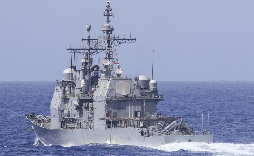 The Ticonderoga-class guided-missile cruiser USS Chancellorsville was forced to "execute all engines back full" and move out of the way of a Russian destroyer in the Philippine Sea, the U.S. Navy says. The Chancellorsville is seen here during a training exercise in the Pacific Ocean.