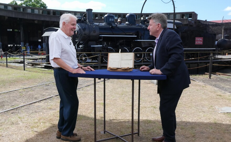Philip Weiss (right) appraises an autograph book, ca. 1900, in Savannah, Ga. ANTIQUES ROADSHOW “Georgia State Railroad Museum, Hour 2” premieres Monday, February 2 at 8/7C PM on PBS.