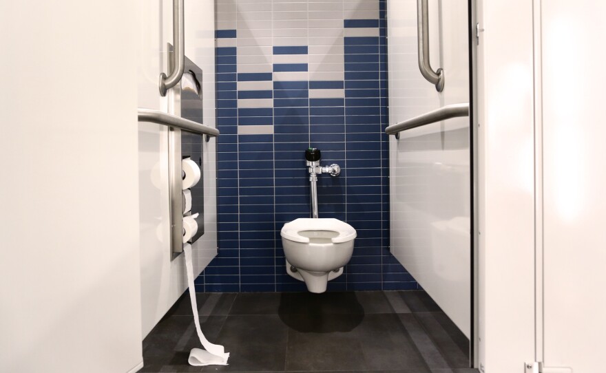 Even cleaning a bathroom daily didn't much affect the make-up of the community of microbes living there, scientists say.