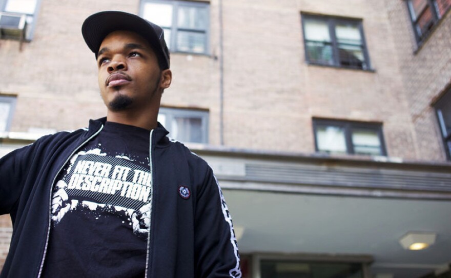Ephraim Benton, a former resident of Tompkins Houses in the Bedford-Stuyvesant section of Brooklyn, is now an actor. Benton started a community-based organization called Beyond Influencing Da Hood, which puts on health fairs, film festivals and various free community events in his old housing project. This photo was taken in front of his old building in Tompkins Houses.