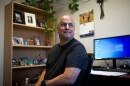 Terry Fiscus, a counselor at Turning Point Community Programs, sits in his office in Sacramento on Thursday, June 23, 2022. 