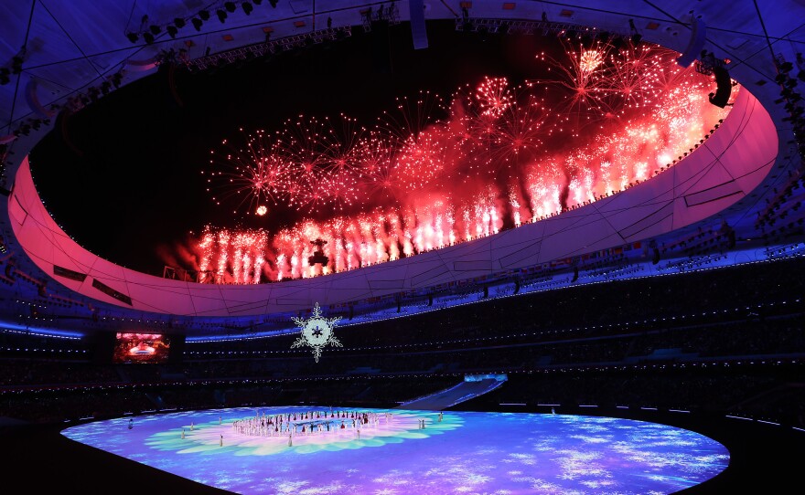 Fireworks are seen as the Olympic cauldron is lit during the Opening Ceremony of the Beijing 2022 Winter Paralympics at the Beijing National Stadium on March 04, 2022 in Beijing, China.