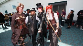 Steampunks wait outside the conference room for Comic-Con's steampunk meetup.
