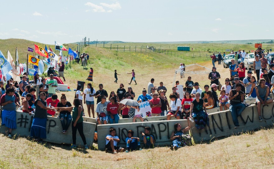 Native American protestors gather at a construction site for the Dakota Access pipeline to perform a daily prayer ceremony. Over 1,000 people, most Native American, have gathered at two prayer camps along the Cannonball River near its confluence with the Missouri in North Dakota to protest the Dakota Access pipeline.