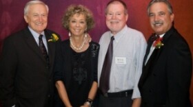 Stephanie Bergsma poses at the KPBS 50th Anniversary Gala with past KPBS General Managers, Paul Steen (left), Doug Myrland (center-right), and current General Manager, Tom Karlo (right). 