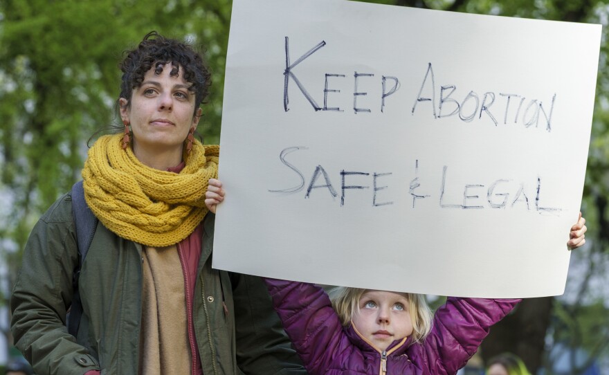 <strong>Portland</strong>: Danielle LaSusa, left, and her daughter Kaia, 6, at a rally in support of abortion rights. "I want her to live in a world where she can have safe access to health care," says LaSusa.