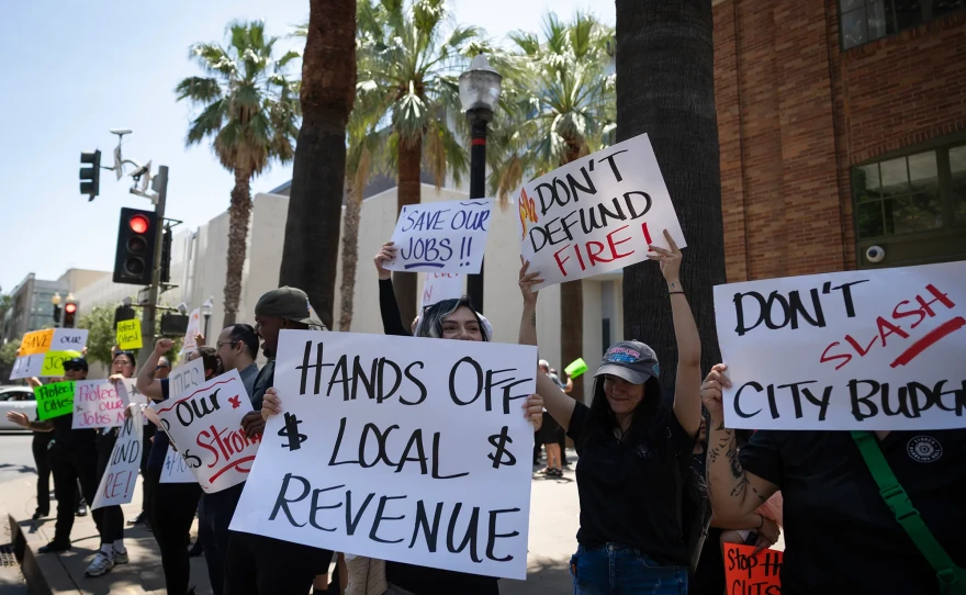 Protesters gather outside the Sheraton Grand Sacramento Hotel in Sacramento on May 21, 2026 to oppose regulations that would end black jack-style games at cardrooms across the state. The state’s cardroom industry recently sued Attorney General Rob Bonta to block the regulations. Bonta was speaking at a CalMatters-sponsored event at the hotel.