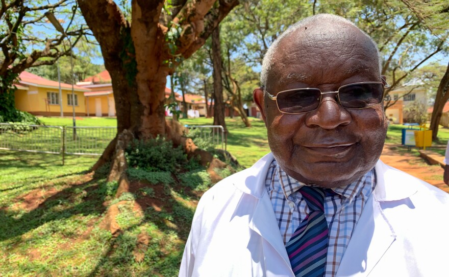 Dr. Ignatius Kakande on the grounds of a hospital in Kampala. In the late 1990s he was an early champion of using liquid morphine as solution to the shortage of effective and cheap painkillers in Uganda.