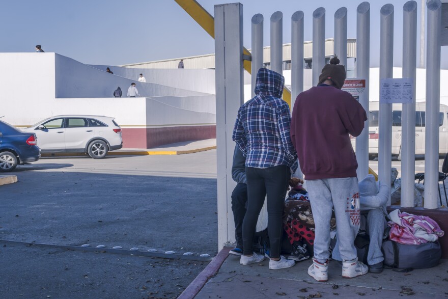 Migrants line up at the El Chaparral border crossing into the United States hoping to get answers about their asylum appointment cancellations after the American government cancels all appointments made through the CBP One app. Jan. 21, 2025 in Tijuana, Mexico.