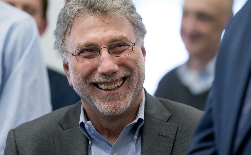 Executive editor Marty Baron smiles as <em>The Washington Post</em> wins two Pulitzer Prizes, April 16, 2018.