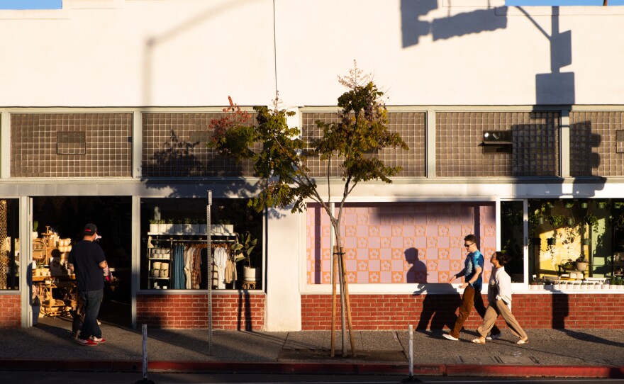 People walk along 30th Street in North Park on Nov. 15, 2022.