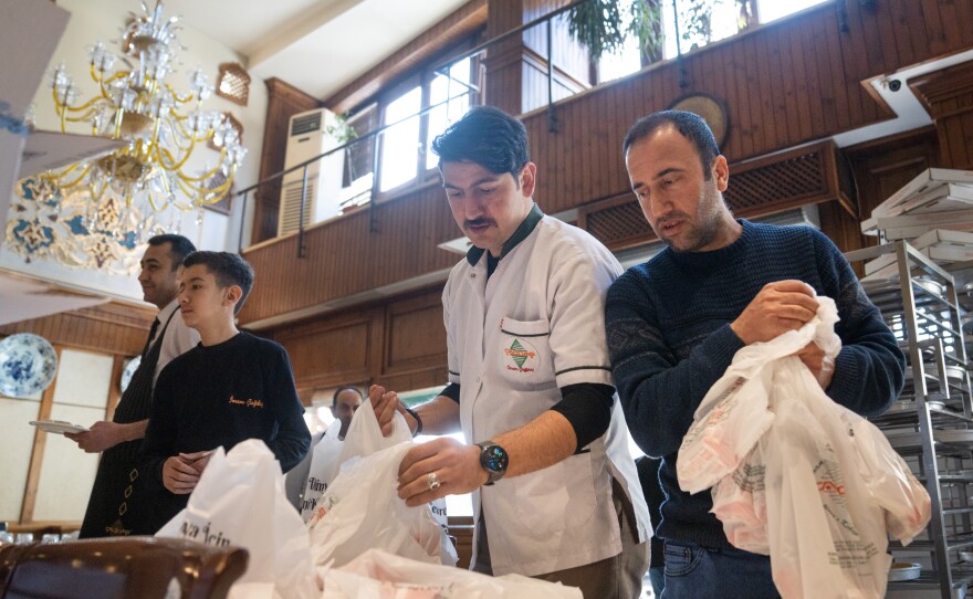 At Imam Cagdas, people bag up halva to donate to residents who are living in tents in Gaziantep.