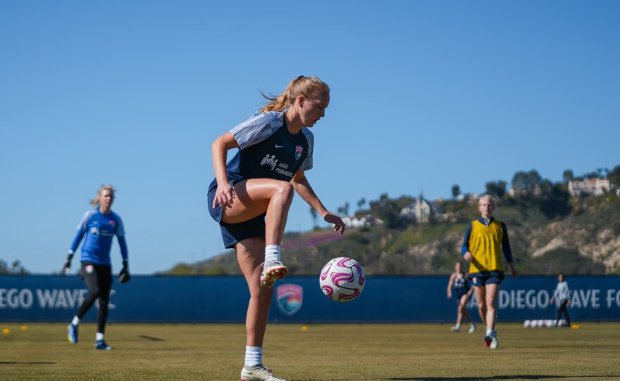 Sierra Enge kicks the ball during Wave FC's 2023 Training Camp at the San Diego Surf Polo Fields in Del Mar on Feb. 6, 2023.