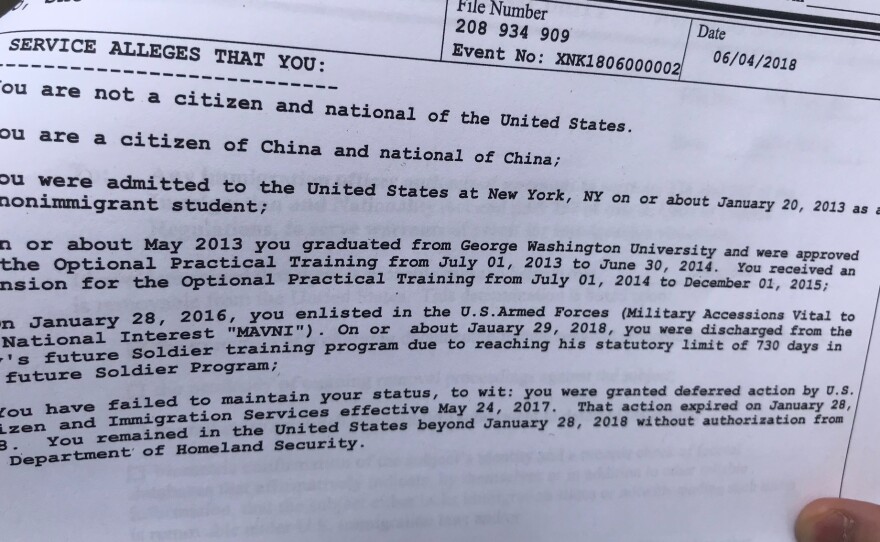 Immigration lawyer Margaret Stock displays a document sent to U.S. Army enlistee Shu Luo, threatening him with deportation.