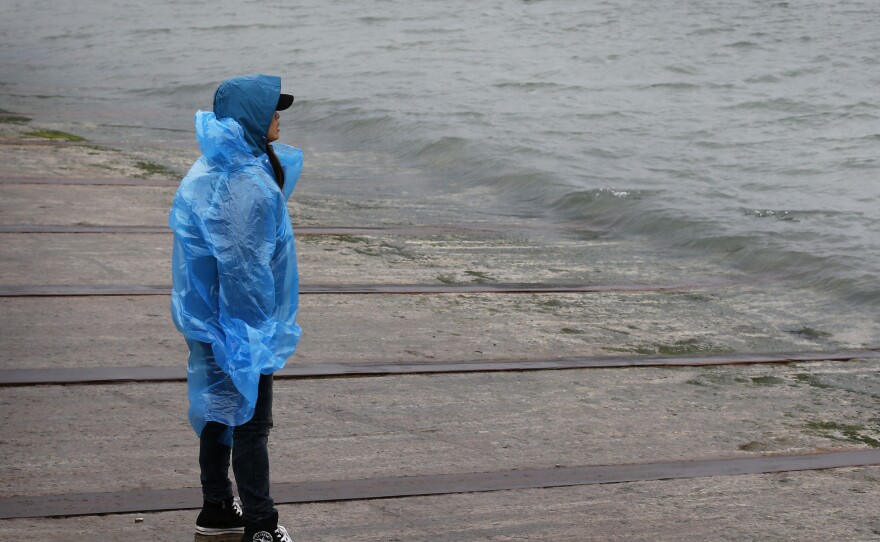 Holding out hope, fearing the worst: A man looks out from the shore in Jindo, South Korea, toward where a passenger ferry sank Wednesday and nearly 300 people are still missing.