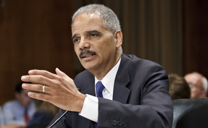 Former Attorney General Eric Holder testifies on Capitol Hill in Washington in June 2012. Holder, now in private practice, has signed on to represent the California Legislature as outside legal counsel.