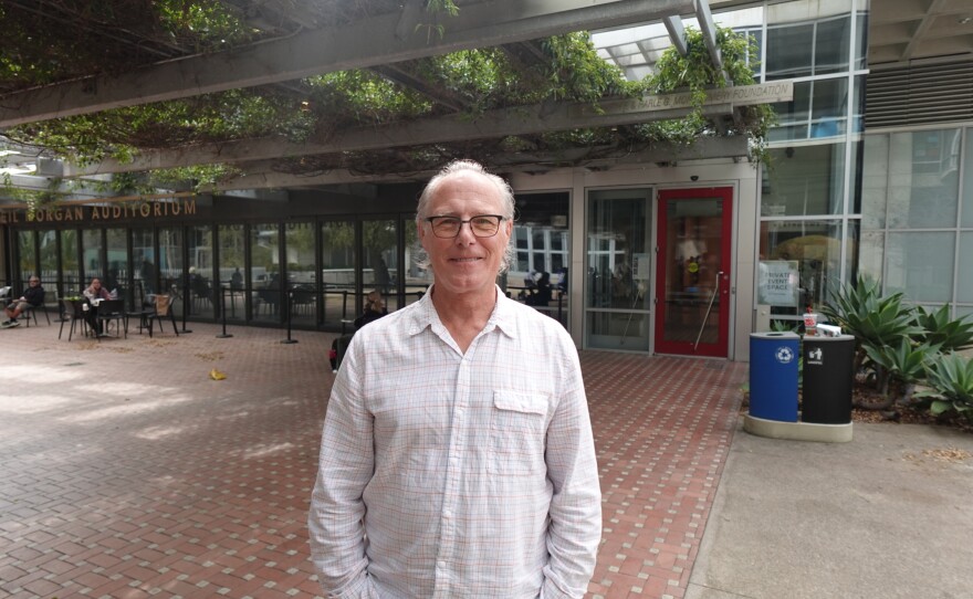 John Evans is shown outside of San Diego Central Library, where he advocates for supporting independent bookstores, on March 10, 2026.