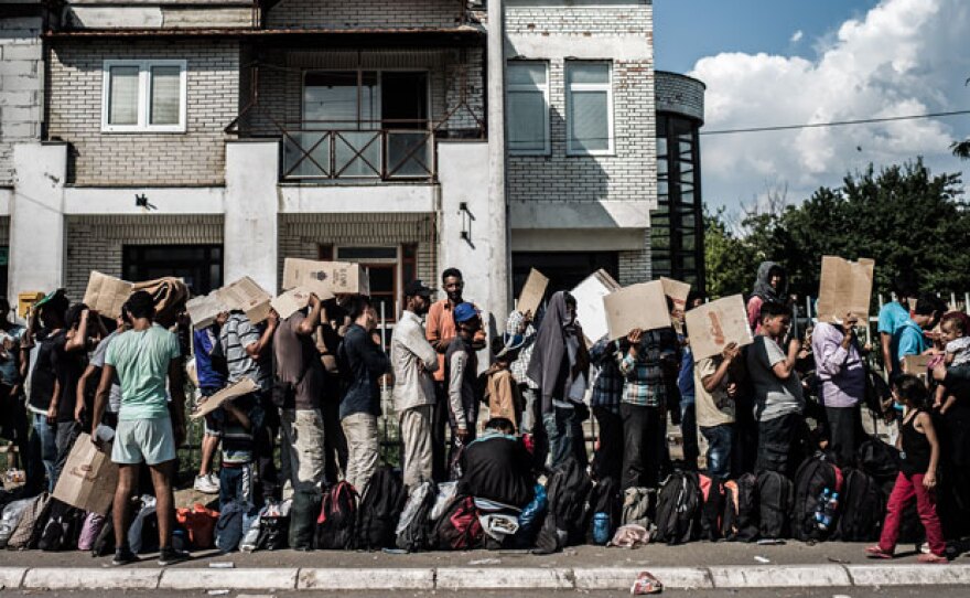 Refugees in Presevo, Serbia, who have just arrived from Macedonia and are waiting for their papers to be processed. “Exodus” tells first-person stories of refugees and migrants fleeing war and persecution for Europe, drawing on footage filmed by the families themselves as they leave their homes on dangerous journeys seeking safety and refuge.