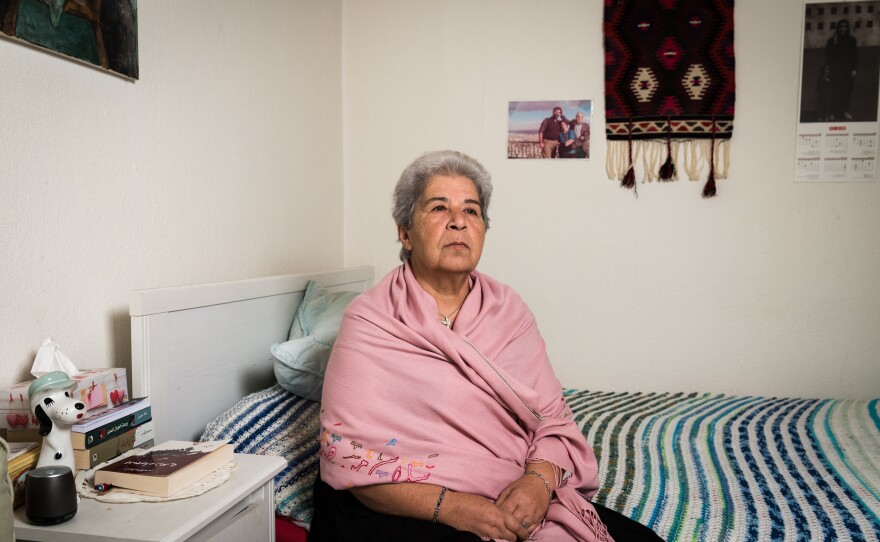 Fadwa Mahmoud sits in her apartment in Berlin. Her husband and her son both disappeared in Syria in 2012. She believes they are still alive, and she has not stopped looking for them since.