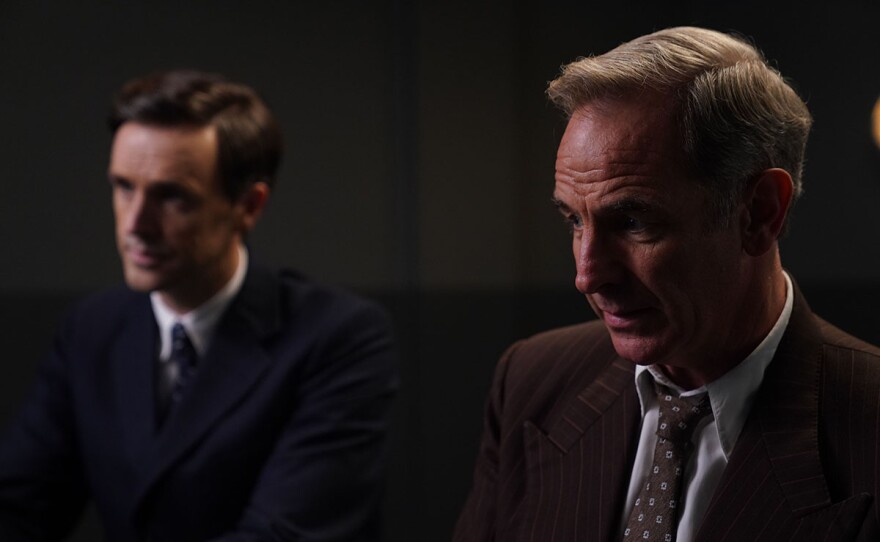 Shown from left to right: Michael D. Xavier as Elliott Wallace and Robson Green as Geordie Keating. In the aftermath of a fatal accident, Will is devastated to be the cause while Geordie rushes to exonerate his friend.