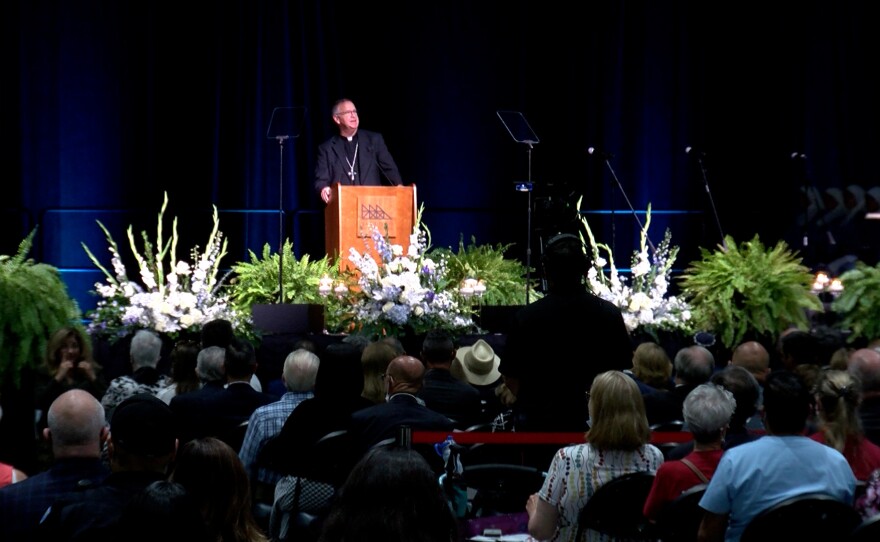 Auxiliary Bishop of the Roman Catholic Diocese of San Diego, the Most Rev. John Dolan, speaks at a memorial for Fr. Joe Carroll at the San Diego Convention Center on August 10, 2021.