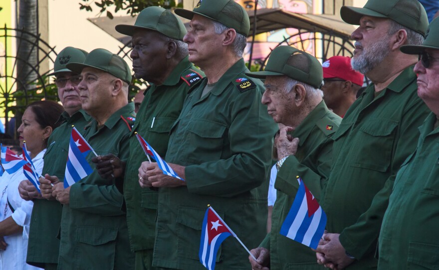 Cuban President Miguel Diaz-Canel, center, attends a celebration marking the 65th anniversary of the proclamation declaring the Cuban Revolution socialist, in Havana, Cuba, Thursday, April 16, 2026.