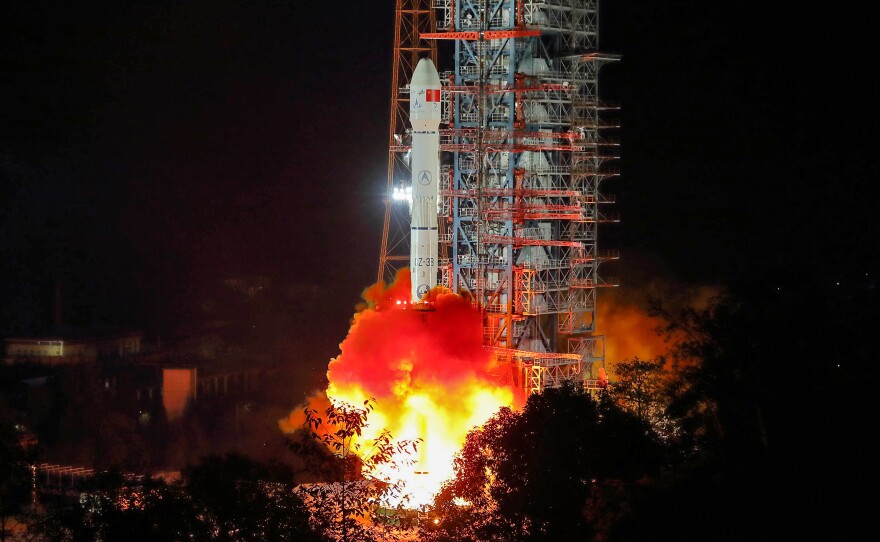 A Long March 3B rocket lifts off from China's Sichuan province early on Dec. 8, carrying a rover destined to land on the far side of the moon.