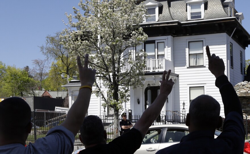 Protesters gathered Monday outside the Graham, Putnam and Mahoney Funeral Parlors in Worcester, Mass., where the body of Boston Marathon bombing suspect Tamerlan Tsarnaev is being prepared for burial.
