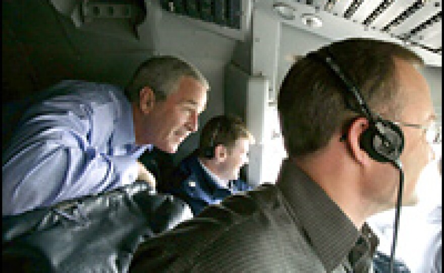 President Bush rides in the cockpit of Air Force One on the final approach before landing in Baghdad.