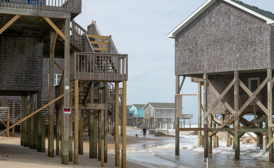 "People should not have to wait for their home to collapse into the water before they can get help," says Rep. Chellie Pingree, D-Maine. Here, homes in Buxton stand over the waves in May.