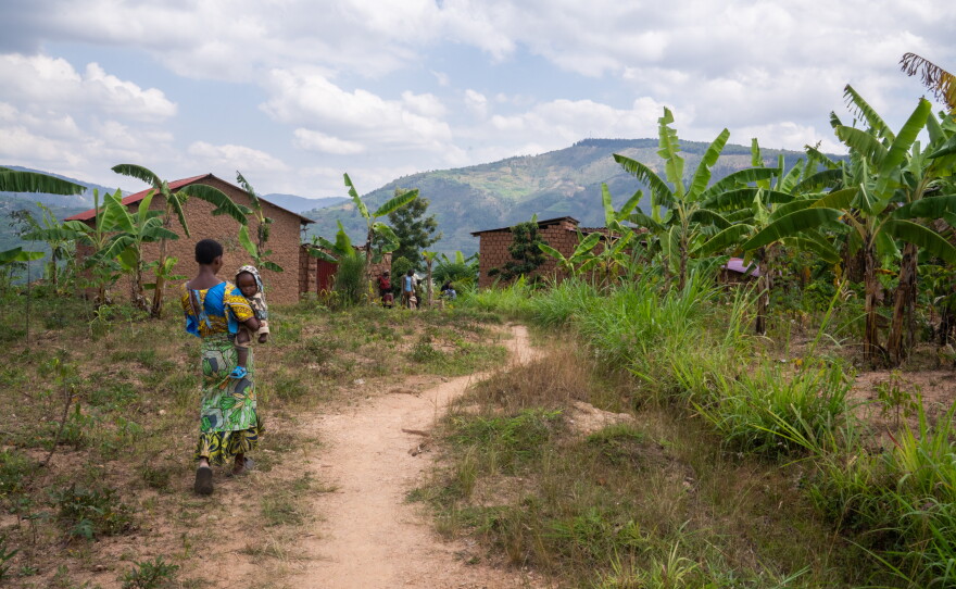 A narrow dirt path leads to Noella Mukanoheli's village, which isn't accessible by car. Many people walk or take motorcycles to get to health facilities.