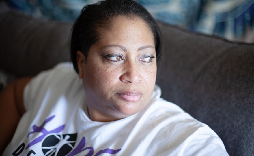 Genea Wall is shown in her City Heights home on May 24, 2021. After losing employment during the pandemic, Wall was approved for San Diego’s rent relief program.