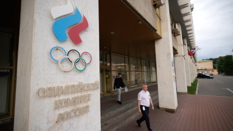 A man walks outside the Russian National Olympic Committee building in Moscow on Tuesday.