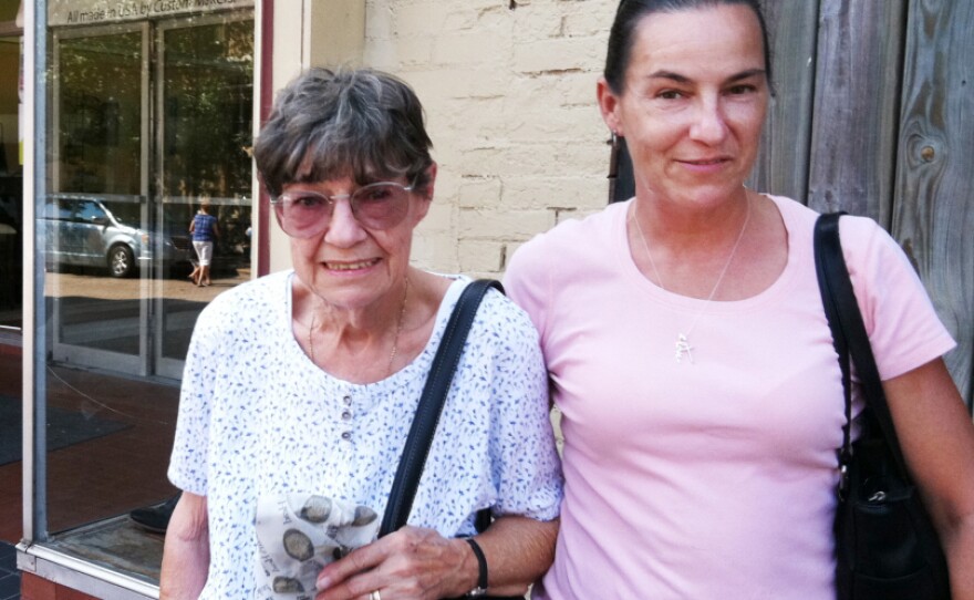Catherine Ridgley of St. Charles, Mo., with her daughter Carryl, says she's had "too much of government."